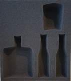 schaumstoffeinlagen für flaschen - formschnitte schaumeinlagen für produkte